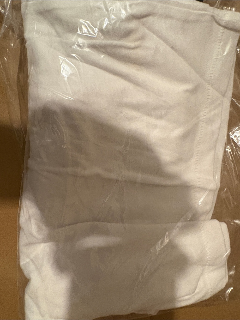 UGG Men's Cream Crewneck Tee (I think this could be unisex).